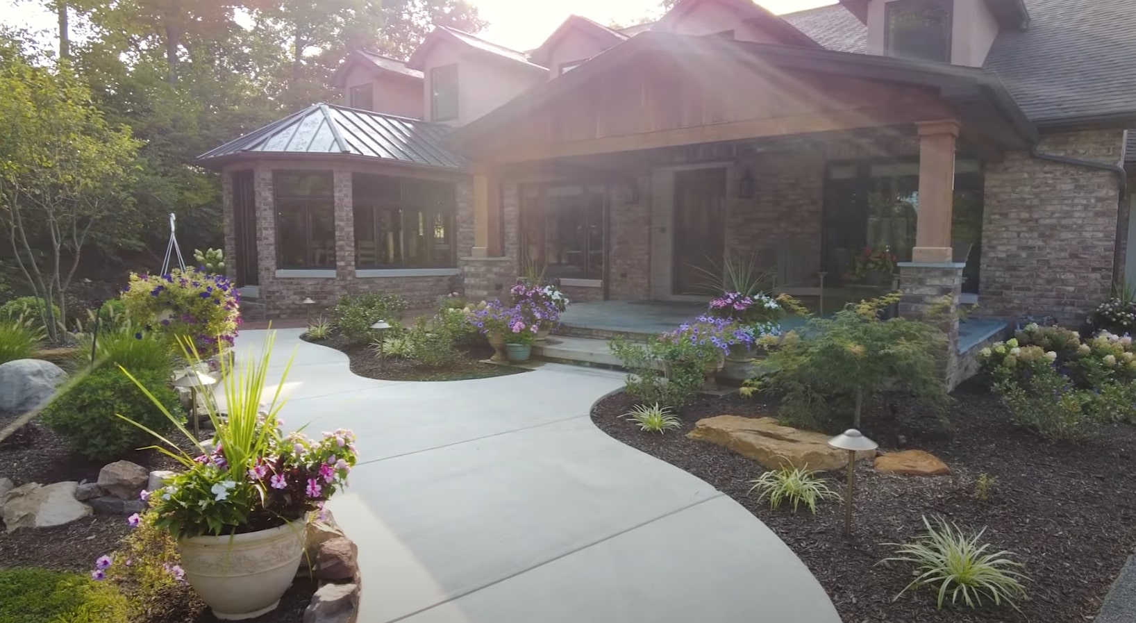 Example of Brookhaven Landscapers' professional residential landscape design work Beautiful residential landscape featuring professional stone work and mature plantings